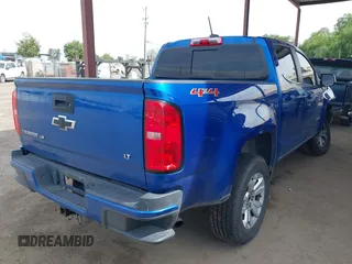 2019 Chevrolet Colorado 4WD LT with VIN 1GCGTCENXK1200876, listed as a IAAI auction lot 42161531 with 87,413 mi miles and . Bid and sale history available at DreamBid. Image 4.