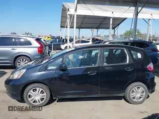2010 Honda Fit with VIN JHMGE8H28AS012129, listed as a IAAI auction lot 41980485 with 144,170 mi miles. Bid and sale history available at carsss.com. Image 14.