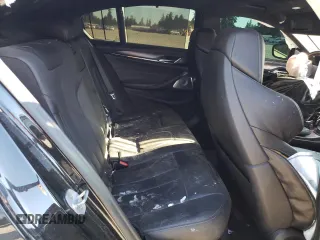 2018 BMW M5 z VIN WBSJF0C57JB283361, wystawiony jako Copart lot #65352164 z przebiegiem Nie podano mil oraz Szkoda całkowita • Salvage title. Historia ofert i sprzedaży dostępna na DreamBid. Obrazek 10.