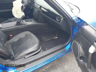 2006 Mazda MX-5 Miata Touring z VIN JM1NC25FX60102209, wystawiony jako IAAI lot #41940771 z przebiegiem 165 003 mil mil oraz . Historia ofert i sprzedaży dostępna na DreamBid. Obrazek 5.