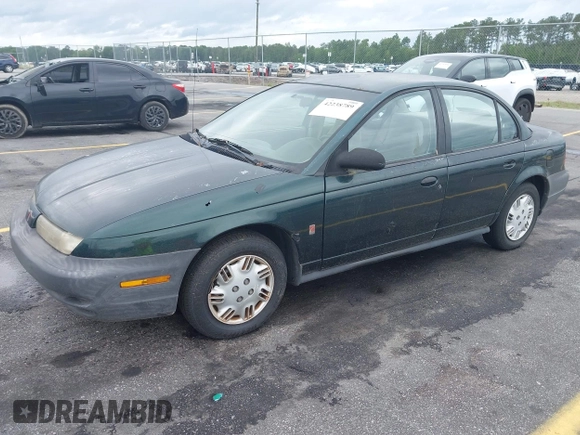 1998 Saturn SL с VIN 1G8ZH5280WZ295857, выставлен на аукционе IAAI как лот 42238789 с пробегом 153 163 миль миль и . История ставок и продаж доступна на DreamBid. Изображение 2.