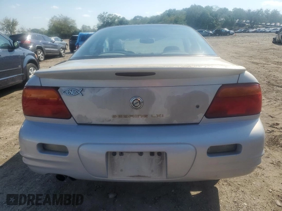 1997 Chrysler Sebring LXi z VIN 4C3AU52NXVE180034, wystawiony jako Copart lot #73413994 z przebiegiem 123 637 mil mil oraz Tytuł czysty. Historia ofert i sprzedaży dostępna na DreamBid. Obrazek 6.