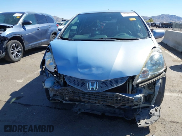 2010 Honda Fit Sport with VIN JHMGE8H48AC025703, listed as a IAAI auction lot 41878642 with 198,469 mi miles. Bid and sale history available at carsss.com. Image 6.