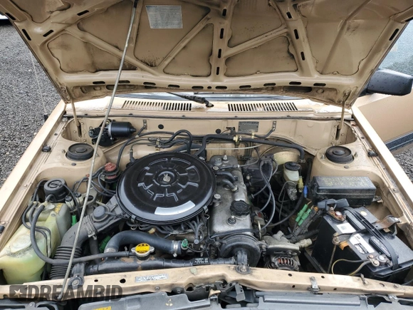 1985 Toyota Tercel z VIN JT2AL35W3F0174785, wystawiony jako Copart lot #50786875 z przebiegiem 499 739 mil mil oraz Szkoda całkowita • Salvage title. Historia ofert i sprzedaży dostępna na DreamBid. Obrazek 11.