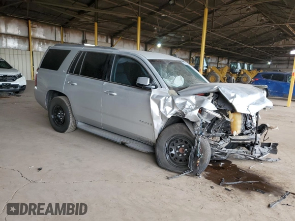 2015 Chevrolet Tahoe LS with VIN 1GNSCAEC3FR115468, listed as a Copart auction lot 47377615 with 145,897 mi miles and Salvage title. Bid and sale history available at DreamBid. Image 4.