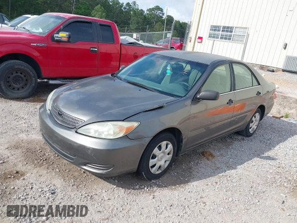 2003 Toyota Camry LE with VIN 4T1BE32K03U727447, listed as a IAAI auction lot 42118785 with 325,881 mi miles and . Bid and sale history available at DreamBid. Image 2.