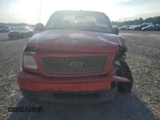 2001 Ford F-150 XL with VIN 2FTRX07LX1CA30894, listed as a Copart auction lot 74761224 with 0 mi miles and Salvage Title. Bid and sale history available at carsss.com. Image 5.