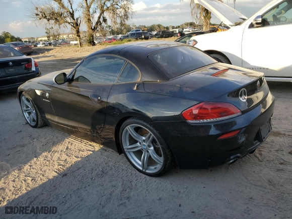 2011 BMW Z4 sDrive35is with VIN WBALM1C56BE633331, listed as a Copart auction lot 73922324 with NaN miles and Salvage Title. Bid and sale history available at carsss.com. Image 2.