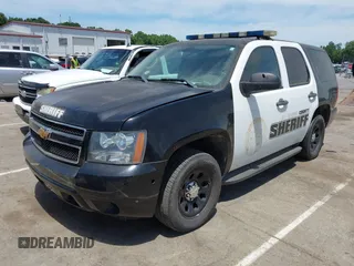 2013 Chevrolet Tahoe Commercial z VIN 1GNLC2E00DR337995, wystawiony jako IAAI lot #42213635 z przebiegiem Nie podano mil oraz . Historia ofert i sprzedaży dostępna na DreamBid. Obrazek 16.