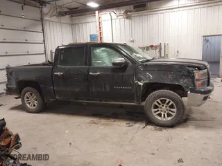 2014 Chevrolet Silverado 1500 LT with VIN 3GCUKREC9EG303803, listed as a IAAI auction lot 41252156 with 149,807 mi miles. Bid and sale history available at carsss.com. Image 14.
