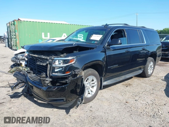 2019 Chevrolet Suburban LS with VIN 1GNSKGKC2KR353977, listed as a IAAI auction lot 42129814 with 85,454 mi miles and . Bid and sale history available at DreamBid. Image 2.