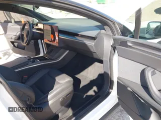 2023 Tesla Model X Plaid with VIN 7SAXCBE63PF405105, listed as a IAAI auction lot 41876918 with 22,475 mi miles and . Bid and sale history available at DreamBid. Image 5.