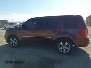 2014 Honda Pilot EX-L with VIN 5FNYF4H52EB055650, listed as a IAAI auction lot 41544068 with 205,942 mi miles and . Bid and sale history available at DreamBid. Image 14.