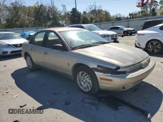 1999 Saturn SL с VIN 1G8ZK527XXZ111390, выставлен на аукционе Copart как лот 49042185 с пробегом 164 733 миль миль и Списание • Salvage title. История ставок и продаж доступна на DreamBid. Изображение 4.