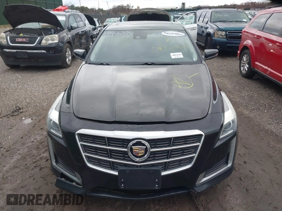 2014 Cadillac CTS Luxury AWD with VIN 1G6AX5SX9E0195923, listed as a IAAI auction lot 40946334 with Not Provided miles and . Bid and sale history available at carsss.com. Image 12.