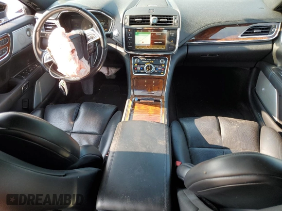 2017 Lincoln Continental Reserve с VIN 1LN6L9NP1H5600693, выставлен на аукционе Copart как лот 64002605 с пробегом 71 443 миль миль и Списание • Salvage title. История ставок и продаж доступна на DreamBid. Изображение 8.
