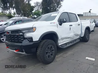 2025 Chevrolet Silverado 1500 with VIN 3GCUKHEL6SG224899, listed as a IAAI auction lot 41828205 with 3,067 mi miles and . Bid and sale history available at DreamBid. Image 2.