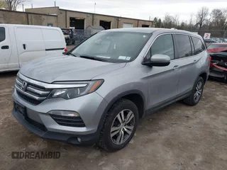 2017 Honda Pilot EX-L with VIN 5FNYF6H5XHB014067, listed as a IAAI auction lot 42083742 with 143,043 mi miles and . Bid and sale history available at DreamBid. Image 17.