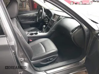 2015 Infiniti Q50 Premium z VIN JN1BV7ARXFM411040, wystawiony jako IAAI lot #41706295 z przebiegiem 97 297 mil mil oraz . Historia ofert i sprzedaży dostępna na DreamBid. Obrazek 5.