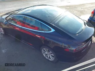 2016 Tesla Model S 70 with VIN 5YJSA1E11GF124965, listed as a IAAI auction lot 41458132 with Not provided miles and . Bid and sale history available at DreamBid. Image 3.