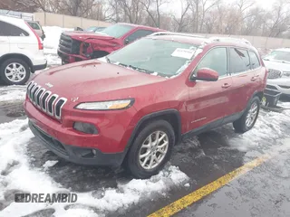 2014 Jeep Cherokee Latitude with VIN 1C4PJMCB8EW166853, listed as a IAAI auction lot 41579386 with 251,683 mi miles and . Bid and sale history available at DreamBid. Image 2.