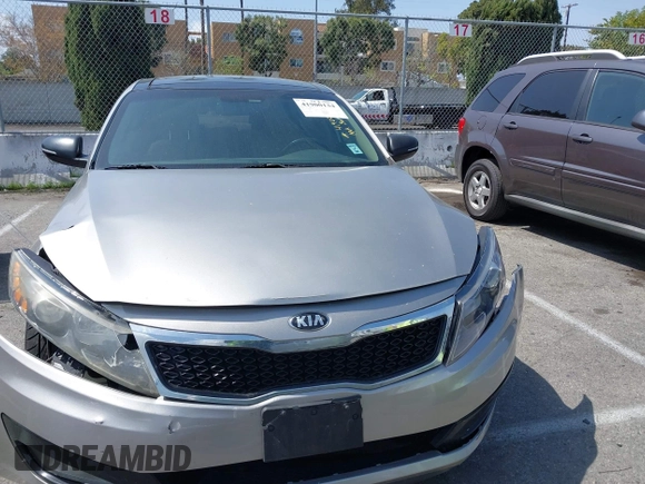 2013 Kia Optima EX z VIN 5XXGN4A70DG148060, wystawiony jako IAAI lot #41900134 z przebiegiem 149 214 mil mil oraz . Historia ofert i sprzedaży dostępna na DreamBid. Obrazek 12.
