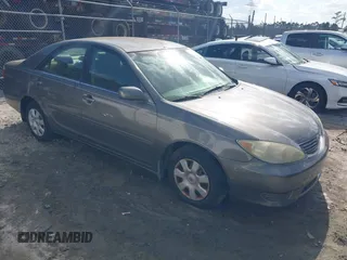 2005 Toyota Camry STD z VIN 4T1BE32K85U573296, wystawiony jako IAAI lot #41997846 z przebiegiem 279 581 mil mil oraz . Historia ofert i sprzedaży dostępna na DreamBid. Obrazek 1.