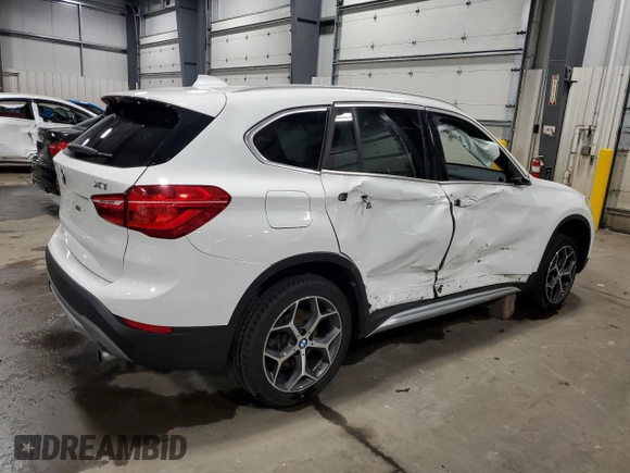 2017 BMW X1 xDrive28i with VIN WBXHT3Z38H4A53824, listed as a Copart auction lot 52500215 with 106,782 mi miles and Salvage title. Bid and sale history available at DreamBid. Image 3.
