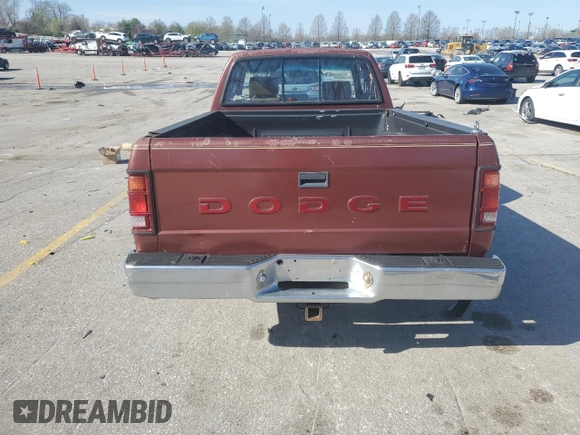 1992 Dodge Dakota z VIN 1B7GL23YXNS633409, wystawiony jako Copart lot #51067775 z przebiegiem 153 174 mil mil oraz Szkoda całkowita • Salvage title. Historia ofert i sprzedaży dostępna na DreamBid. Obrazek 6.