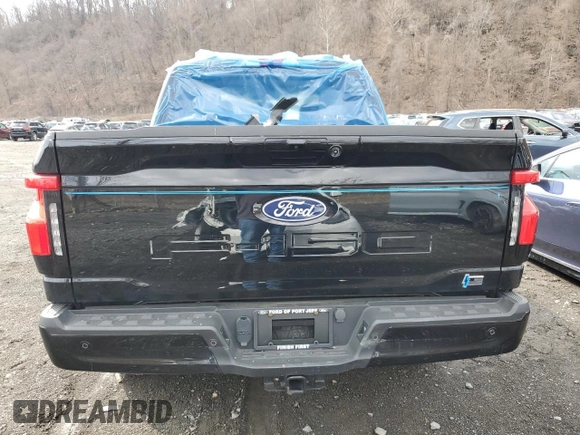 2024 Ford F-150 Lightning Flash z VIN 1FT6W3L78RWG03307, wystawiony jako Copart lot #58934425 z przebiegiem 3621 mil mil oraz Szkody całkowita. Historia ofert i sprzedaży dostępna na DreamBid. Obrazek 6.
