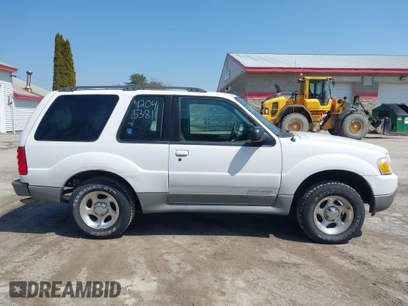 2002 Ford Explorer Sport Value z VIN 1FMYU60E62UD21697, wystawiony jako IAAI lot #42045381 z przebiegiem 122 286 mil mil oraz . Historia ofert i sprzedaży dostępna na DreamBid. Obrazek 14.