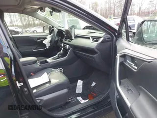 2023 Toyota RAV4 Hybrid XLE Premium with VIN JTMB6RFV5PD115565, listed as a IAAI auction lot 41787098 with 13,386 mi miles. Bid and sale history available at carsss.com. Image 5.
