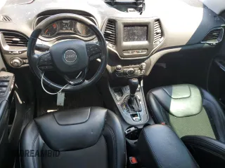2021 Jeep Cherokee Altitude with VIN 1C4PJLLBXMD144549, listed as a Copart auction lot 62163435 with 94,571 mi miles and Salvage title. Bid and sale history available at DreamBid. Image 8.