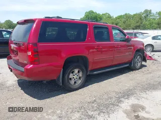 2012 Chevrolet Suburban LT with VIN 1GNSKJE7XCR239853, listed as a IAAI auction lot 42365421 with 283,450 mi miles and . Bid and sale history available at DreamBid. Image 4.