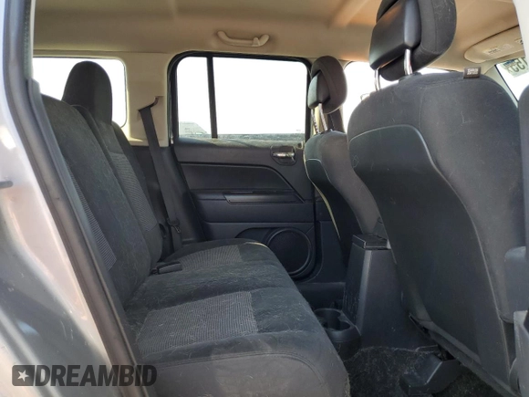 2015 Jeep Patriot Latitude with VIN 1C4NJPFB1FD157025, listed as a Copart auction lot 52310155 with 132,752 mi miles and Salvage title. Bid and sale history available at DreamBid. Image 11.