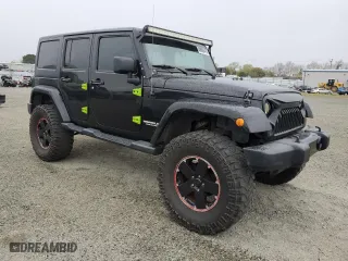 2012 Jeep Wrangler Unlimited Sahara with VIN 1C4HJWEG4CL269873, listed as a Copart auction lot 49000475 with 176,135 mi miles and Clean Title. Bid and sale history available at carsss.com. Image 4.