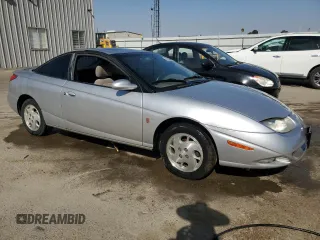 2002 Saturn SC with VIN 1G8ZY12712Z186012, listed as a Copart auction lot 68756684 with 140,205 mi miles and Clean Title. Bid and sale history available at carsss.com. Image 4.