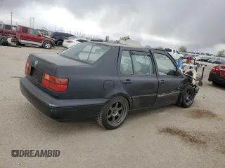 1996 Volkswagen Jetta с VIN 3VWRA81H5TM069238, выставлен на аукционе Copart как лот 42831195 с пробегом 226 935 миль миль и Списание • Salvage title. История ставок и продаж доступна на DreamBid. Изображение 3.