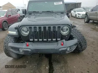 2023 Jeep Gladiator Rubicon with VIN 1C6JJTBG7PL573197, listed as a Copart auction lot 53866075 with 19,521 mi miles and Salvage title. Bid and sale history available at DreamBid. Image 14.