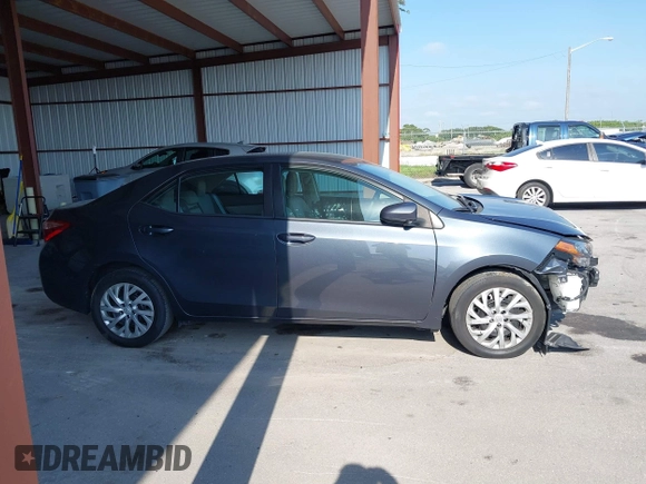 2019 Toyota Corolla L z VIN 2T1BURHE7KC183584, wystawiony jako IAAI lot #42302045 z przebiegiem 110 845 mil mil oraz . Historia ofert i sprzedaży dostępna na DreamBid. Obrazek 13.