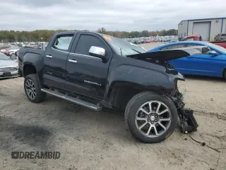 2022 GMC Canyon 2WD Denali with VIN 1GTG5EEN3N1107952, listed as a Copart auction lot 76716143 with 0 mi miles and Salvage Title. Bid and sale history available at carsss.com. Image 4.