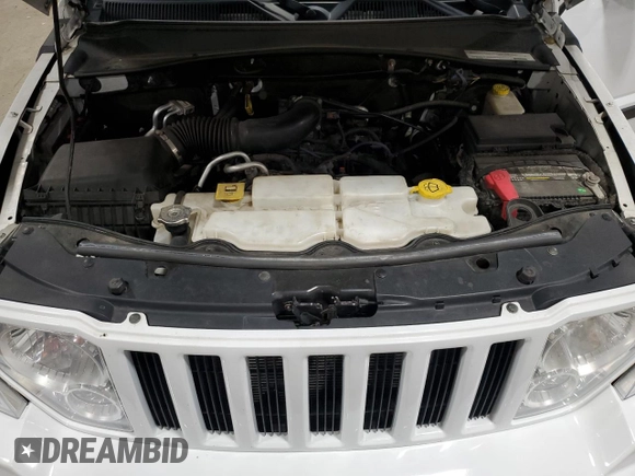 2012 Jeep Liberty Sport with VIN 1C4PJMAK1CW171926, listed as a Copart auction lot 83310004 with 180,085 mi miles and Salvage Title. Bid and sale history available at carsss.com. Image 13.
