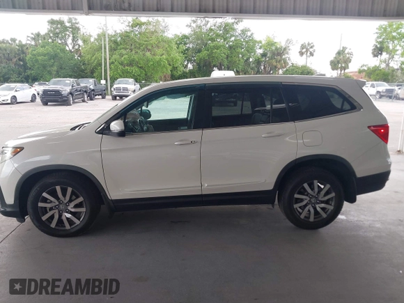 2019 Honda Pilot EX-L with VIN 5FNYF6H57KB011649, listed as a IAAI auction lot 41880951 with 99,504 mi miles. Bid and sale history available at carsss.com. Image 14.