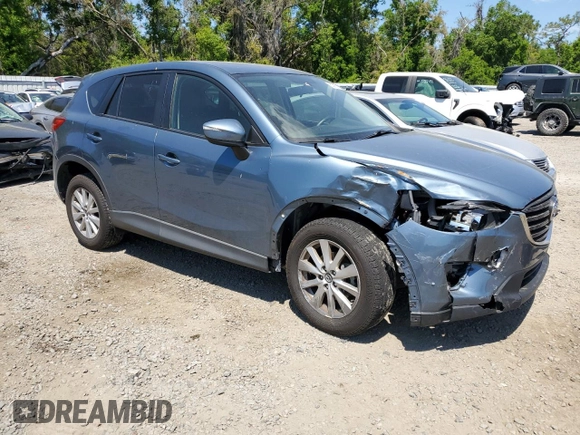2016 Mazda CX-5 Touring with VIN JM3KE2CY0G0894283, listed as a Copart auction lot 50592065 with 86,400 mi miles and Salvage Title. Bid and sale history available at carsss.com. Image 4.