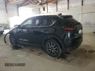 2018 Mazda CX-5 Grand Touring with VIN JM3KFBDM4J0412835, listed as a Copart auction lot 55441315 with 191,968 mi miles and Salvage title. Bid and sale history available at DreamBid. Image 2.