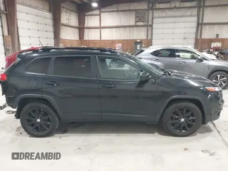 2014 Jeep Cherokee Latitude with VIN 1C4PJMCS6EW299532, listed as a IAAI auction lot 41833888 with 199,915 mi miles and . Bid and sale history available at DreamBid. Image 13.
