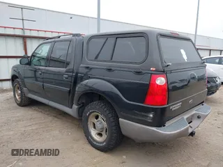 2003 Ford Explorer Sport Trac XLS z VIN 1FMZU77E43UB90738, wystawiony jako IAAI lot #41607465 z przebiegiem 223 708 mil mil oraz . Historia ofert i sprzedaży dostępna na DreamBid. Obrazek 3.
