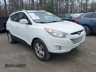 2013 Hyundai Tucson GLS with VIN KM8JU3AC5DU693550, listed as a IAAI auction lot 41919615 with 202,517 mi miles. Bid and sale history available at carsss.com. Image 1.