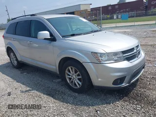 2014 Dodge Journey SXT z VIN 3C4PDCBB0ET133029, wystawiony jako IAAI lot #42434575 z przebiegiem 218 609 mil mil oraz . Historia ofert i sprzedaży dostępna na DreamBid. Obrazek 1.