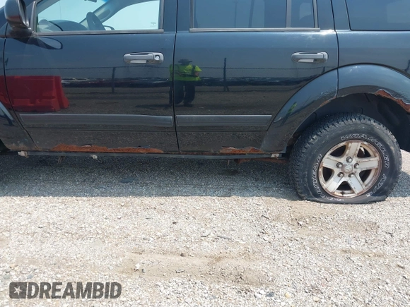 2005 Dodge Durango SLT with VIN 1D4HB48D35F576037, listed as a IAAI auction lot 42873937 with 238,266 mi miles and . Bid and sale history available at DreamBid. Image 6.